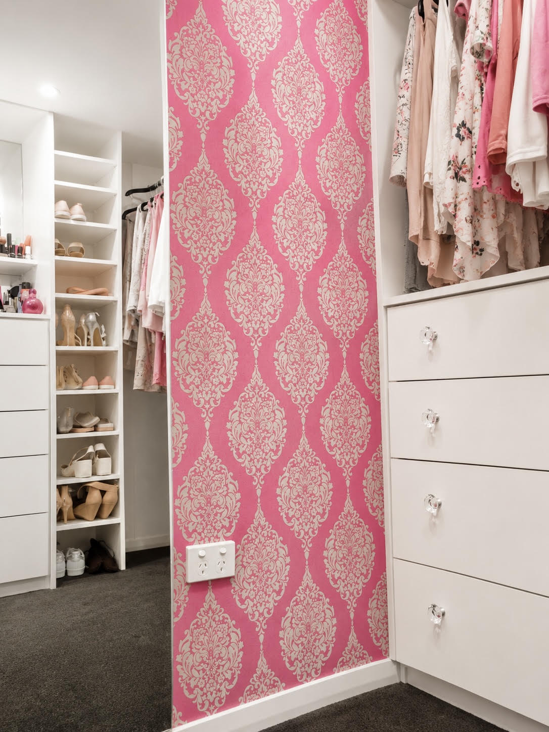 Walk-in robe with shoe shelving, hanging space and drawers